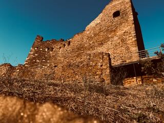 The castle of Scarlino at sunset
